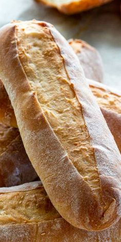 two loaves of bread sitting on top of each other