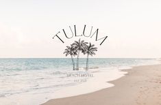 two palm trees on the beach next to the ocean with text that reads tulum