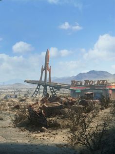 an image of a sci - fi scene with a rocket ship in the background and mountains in the distance