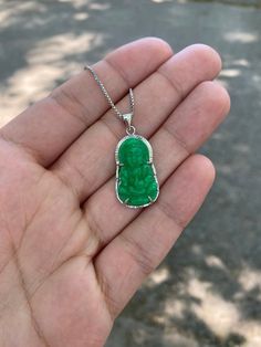 "This Buddha necklace is made with quality materials and craftsmanship, perfect to wear proudly around town. Information: ✨ .925 Sterling Silver (stamped) ✨ Genuine green Jade stone, hand craved with the image of Guanyin and perfectly polished for an amazing luster. ✨ Hypoallergenic  ✨ Tarnish resistant (yes, no more worrying about your favorite piece changing colors) ✨ Plated with a layer of Rhodium: gives the silver a perfect shine and allows you to wear it more often without having to clean it frequently. The size of this Buddha necklace is perfect, it can be worn by itself as a dainty (yet, statement) piece or layered with your favorite jewelry. I have 2\" chain extensions available per request, just let me know in a note and it will get done. This item is also available in 14K gold pl Jade Buddha Necklace, Green Jade Necklace, Jade Buddha, Weird Jewelry, Buddha Necklace, Laughing Buddha, Buddha Pendant, Necklace Green, Jade Necklace