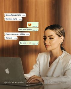 a woman sitting in front of a laptop computer on top of a table with chat bubbles above her