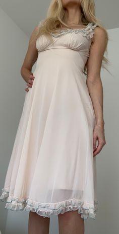 Beautiful condition pink/ivory negligee with ruffle trim at collar and bottom hem. Modeled on a 4/6, best fits a size M. Please note, this dress is sheer and is pictured on wearer with a slip.  Great for date night or even with a cute oversized blazer for a daytime look! Message me if you have any questions! Please note, when purchasing vintage please anticipate regular wear and tear on garments. Anything alarming with be noted in advance. Happy shopping! Negligee Dress, Bullet Bra, Date Night Dress, Sleepwear Fashion, Frilly Dresses, Old Fashion Dresses, Causal Outfits, Pink Ivory, Silk Slip Dress