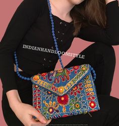 Indian Rajasthani Jaipuri Art Sling Bag Fold Over Clutch Purse With Multiple Colour For Women and Girl Party Wedding Carry. Handicrafts and Jewellery Designer Women Sling Bags, Evening Handbags for women Best for gifting, Diwali Gift, Wedding Favors, Indian Sling bags. SURPRISE GIFT: You may get a free surprise gift parcel from us. Pack of - Assorted Colors bags. * Material: polyester Embroidered fabric (Both Side Work) * Size : 23x18 Inches * Type: Casual, Ethnic, traditional, wedding, embroide Traditional Blue Bags For Festivals, Traditional Blue Shoulder Bag For Festivals, Handmade Blue Shoulder Bag For Festivals, Bohemian Multicolor Potli Bag For Diwali, Traditional Blue Bags Suitable For Gifts, Traditional Blue Embroidered Shoulder Bag, Blue Rectangular Shoulder Bag For Festivals, Festive Dori Work Shoulder Bag, Traditional Handmade Blue Shoulder Bag