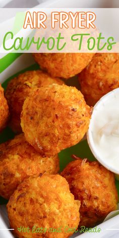 air fryer carrot tots in a white bowl with ranch dressing on the side