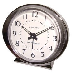 an alarm clock on a white background with the words baby ben in black and white