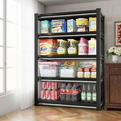 a shelf filled with lots of food next to a window