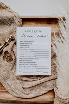 a wooden box with a card that says bride and groom, next to a pair of scissors