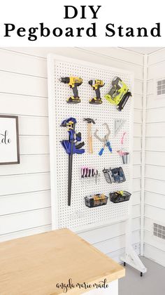 the pegboard stand is organized with tools