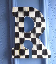 the letter p is painted black and white checkered