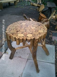 a wooden table made out of tree slices