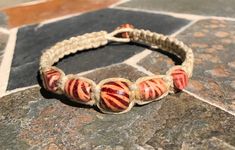 "*Please read below for sizing and item details* Hemp bracelet with wooden beads.  Made with natural hemp.  This bracelet is a 8\" fit and features five wooden beads on a square knot design. It finishes with a wooden bead and loop closure.  The hemp is 2mm thickness giving it a 3/8\" width.  *When measuring the fit of a bracelet/anklet be sure to measure your wrist/ankle. The size is determined by the inner circumference of the piece not the length of the item* *Please note that natural hemp jew Hippie Bracelet, Hemp Bracelet, Jewelry Hippie, Hemp Jewelry, Hemp Bracelets, Square Knot, Hippie Bracelets, Knot Design, Boho Bracelet