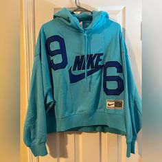 Never Been Worn. I Took The Tags Off Thinking It Would Fit, But It’s Too Big. Size Xs, But Fits Like A Medium. I Paid $130 Blue Logo Print Sweatshirt For Spring, Sporty Blue Top For Streetwear, Winter College Nike Tops, Sporty Light Blue Sweatshirt For Streetwear, Nike Tops With Letter Print For Fall, Light Blue Sporty Sweatshirt For Streetwear, Blue Letter Print Sportswear Tops, Blue Graphic Print Sportswear Hoodie, Blue Graphic Print Sweatshirt Sportswear