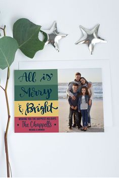 a christmas card with the words all is merry and bright on it next to two silver stars