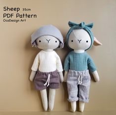 two stuffed animals sitting next to each other on a shelf with the words sheep 35cm pdf pattern