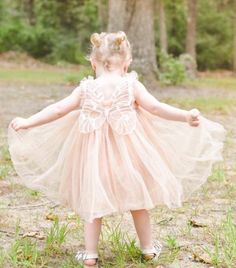 Enchanting Fairy Dress The dress is a beautiful Champagne / Tan dress with Wings. If you want your daughter, grand daughter, nieces, cousin to look AMAZING, this is the PERFECT DRESS <3  This little dress is a timeless dress that will make your little princess dream ! The back has beautiful butterfly/fairy wings attached to it.  To care for this dress you can wash them in the washing machine and let them air dry.  The bust is stretchy to help with a snug fit.  Please refer to sizing guide if you Birthday Second, Butterfly Fairy Wings, First Birthday Dress, Dress Butterfly, Wings Dress, First Birthday Dresses, Dress Fairy, Grand Daughter, Tan Dress