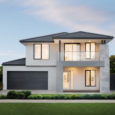 a two story house with an attached garage