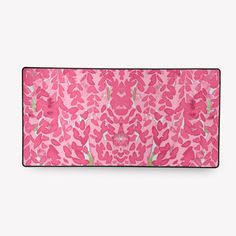 a pink and green floral print laptop sleeve