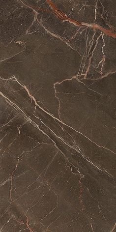 a brown marble floor with red and white lines