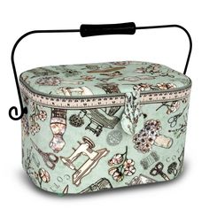 a sewing box with scissors and other items on the inside, sitting on a white surface