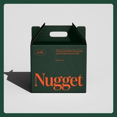 a green box with an orange nugget logo on the front and bottom side