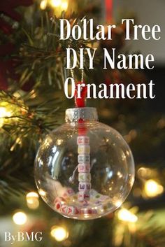 a christmas ornament hanging from a tree with the words dollar tree diy name ornament