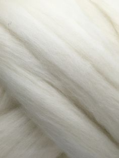 the white yarn is very thick and soft, it looks like something out of an animal's fur