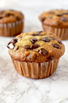 chocolate chip muffins sitting on top of a counter