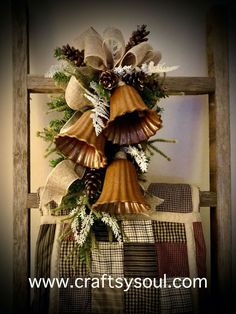 a chair with a christmas decoration on it and pine cones hanging off the back of it