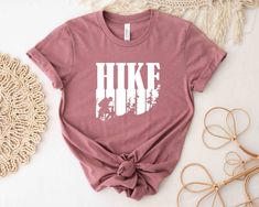 Description Hiker Shirt, Hiking Shirt, Hiking Gift, Hike Shirt, T-Shirt Hiking, TShirt Hiking Shirts, Hiking Tee, Camping Shirt, Camping Gift     HOW TO ORDER      1. Check photos for sizing and color options  2. Select size and color from the drop-down menus  3. Add to cart & Place order  4. Your shirt is now off to production and will be ready for shipment in 1-3 days!      SHIRT SIZING    All shirts come in 12+ colors and 6 sizes, ranging from Small to 3X-Large.    PRODUCTION & SHIPPING    Or Hiking Tshirt, Hiking Shirt, Hiking Gifts, Hiking Shirts, Camping Gifts, Camping Shirt, Cotton Lights, Summer Tshirts, Shirt Price