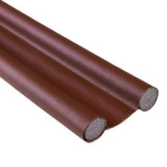 a roll of brown leather with two silver circles