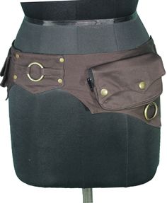 An awesome brown waist bag with steampunk/festival vibes. Strong, adjustable double popper fastening on the waistband. THE WAISTBAND ADJUSTS FROM 72cms - 112cms. This pocket belt is ideal for steampunk outfits / cosplay but can also be worn at any time you need to keep your load light and your hands free. So this style of belt has become super popular for festivals, raves, parties, travelling and a whole host of other occasions. ------------------------------------------------------------------- Steampunk Belt Bag For Everyday Use, Gothic Brown Bag For Everyday Use, Gothic Brown Bag, Brown Belt Bag For Festival, Steampunk Outfits, Steampunk Festival, Belly Bag, Festival Belt, Travel Belt