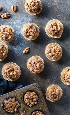 mini pumpkin muffins with pecan crumbs in the middle and on top