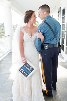 a bride and groom pose for a photo on their wedding day