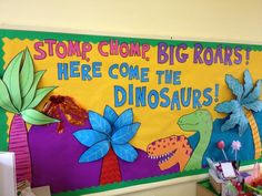 there is a sign that says stop chomp, big roars here come the dinosaurs