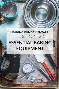 baking essentials on an old metal tray with the words, lesson 2 essential baking equipment