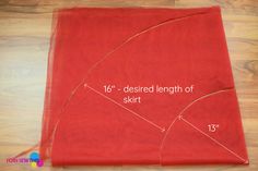 a red cloth is shown with measurements for the length