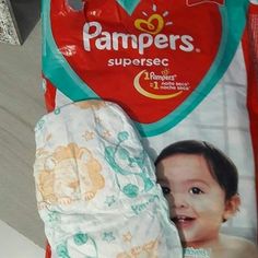 a package of diapers is laying on the floor