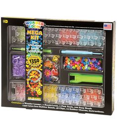 the box is full of different types of beads and magnets for kids to play with