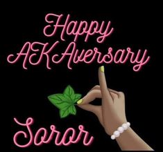 a happy anniversary card with a hand holding a green leaf and the words, happy anniversary sari