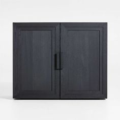 a black cabinet with two doors on the top and bottom, against a white background