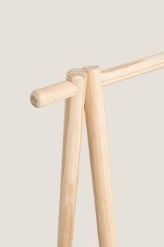 two wooden sticks sticking out of each other