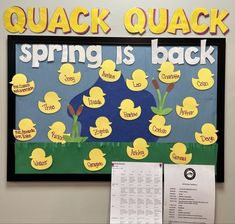 a bulletin board with ducks on it and words that spell out spring is back in the classroom