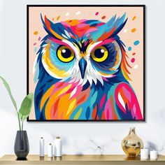 an owl painting on the wall above a table