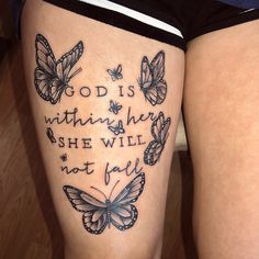 a woman's thigh with butterflies on it and the words god is within her she will not fly