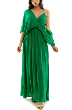 Flowy and chic, this maxi dress features a flattering smocked waist and split hem. 63" length (size Medium) V-neck Elbow-length sleeves Lined 100% rayon Dry clean Imported Green V-neck Maxi Dress With Smocked Back, Stretch Ruched Maxi Dress, Green Sleeveless Dress With Elastic Waistband, Maxi Length Dresses With Smocked Back And Flowy Skirt, Maxi Dress With Smocked Back And Flowy Skirt, Flowy Maxi Dress With Smocked Back, Spring Stretch Ruched Maxi Dress, Elegant Dresses With Stretch Elastic Waistband, Stretch Ruched Maxi Dress For Spring