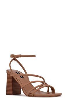 A stacked block heel and tubular straps distinguish a faux-leather sandal that will complement your modern-chic style. 3" heel Synthetic upper, lining and sole Imported Light Tan, Modern Chic, Nine West, Leather Sandals