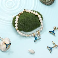 Mermaid Tail Pearl Bracelet is inspired by marine life on sale in Selenichast jewelry store. This is a good piece of pearl jewelry and also fine bracelet among nature jewelry collection ﻿These personalized mermaid tail bracelets for women are impressive in their charms of storied and poetical associations. The romantic story of mermaid tails makes it a meaningful gift for the one you love. The design of strings of freshwater pearls and an enamelled mermaid tail pendant bring elegance and renewed Fine Bracelet, Romantic Story, Star And Moon Necklace, Ocean Inspired Jewelry, Rabbit Earrings, Funny Earrings, Mermaid Bracelet, Pearl Gifts, Diamond Evil Eye