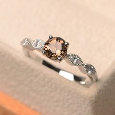 Elegant Topaz Crystal Ring Round Cut, Elegant Brown Diamond Ring, Elegant Brown Diamond Ring For Formal Occasions, Brown Round Diamond Ring, Fine Jewelry Brown Diamond Ring, Elegant Brown Diamond Round Ring, Brown Round Diamond Ring In Fine Jewelry Style, Brown Diamond Ring In Fine Jewelry Style, Elegant Smoky Quartz Brown Rings