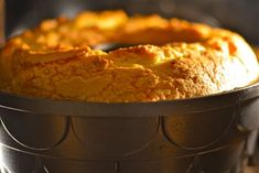 a bundt cake sitting on top of a metal pan