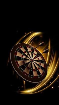 a dart hitting in the center of a bulls eye on a black background with gold swirls